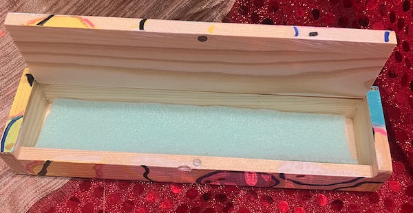 Inside of the wooden box