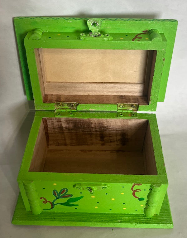 A hand painted green wood box