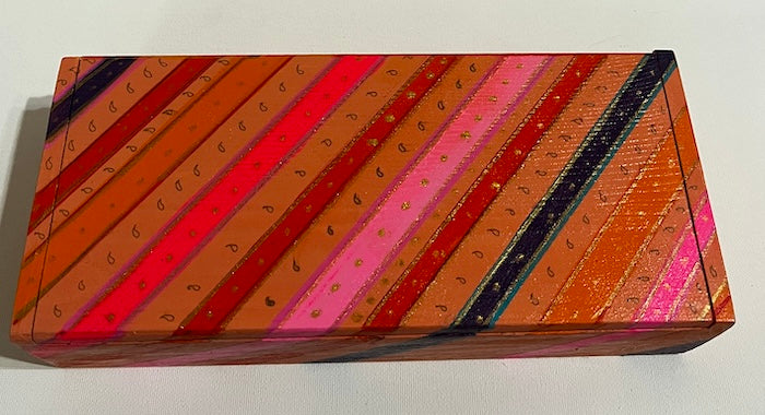 A colorful gift box stripes and dots