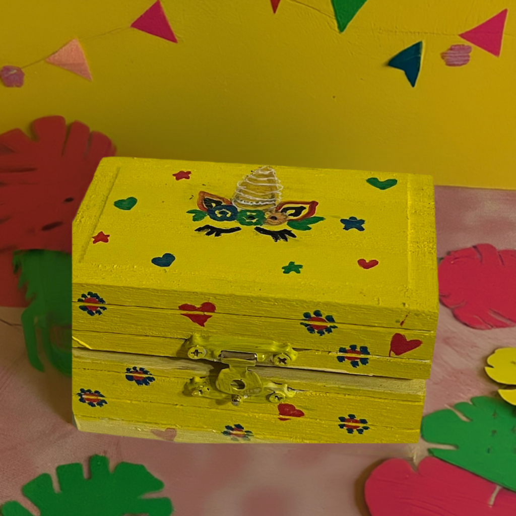 A yellow bright and beautiful hand painted unicorn box