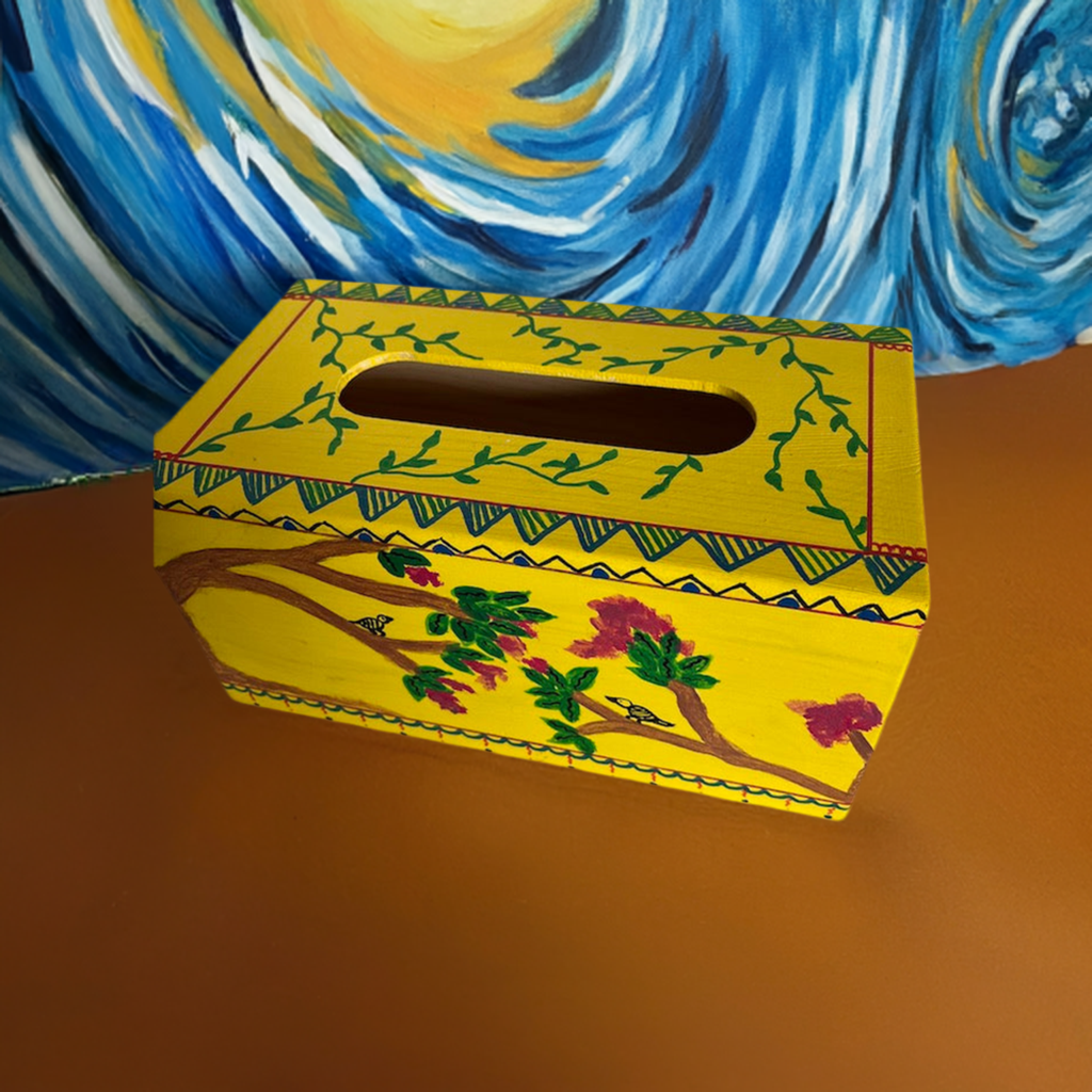 A hand painted yellow tissue box coverr