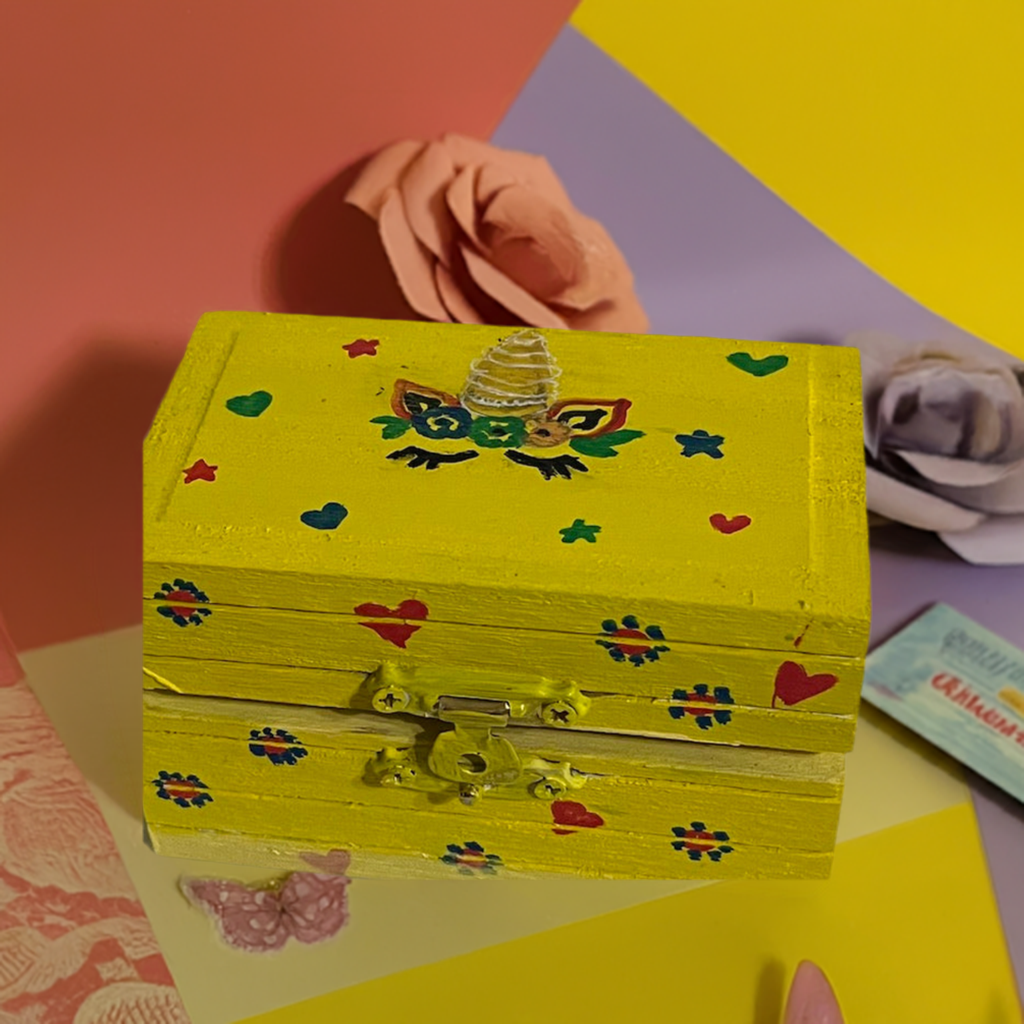 A yellow bright and beautiful hand painted unicorn box