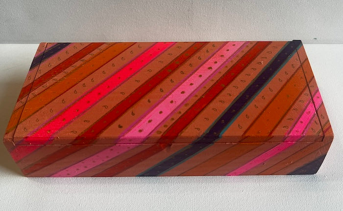 A colorful gift box stripes and dots