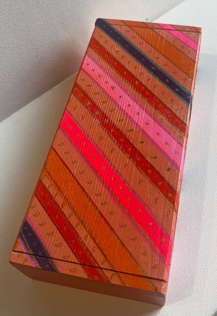 A colorful gift box stripes and dots