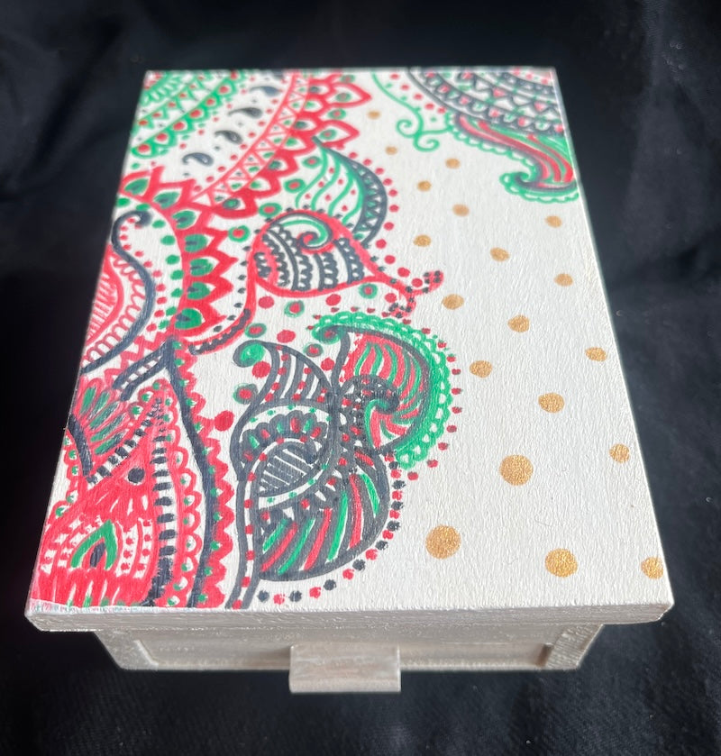 A mini hand painted jewelry box