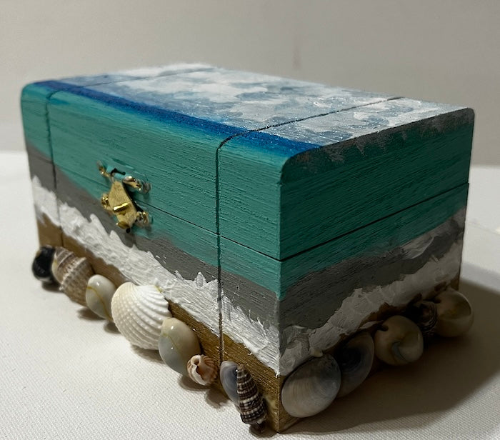 A shell hand painted wooden box
