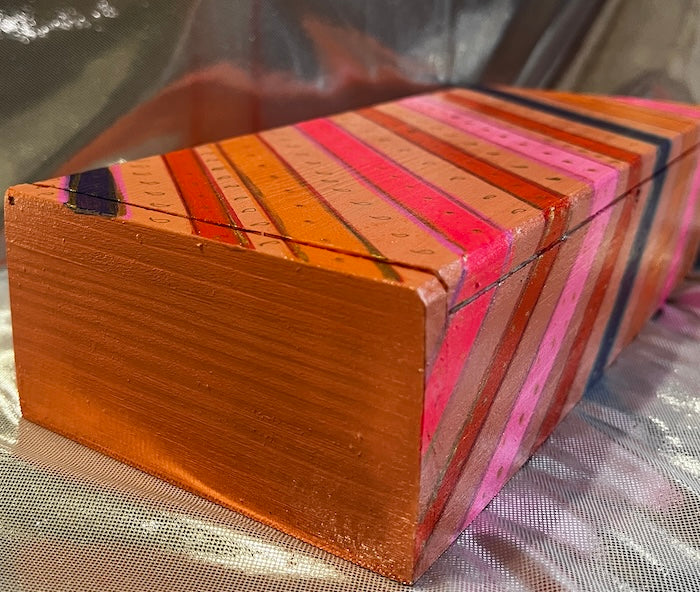 A colorful gift box stripes and dots