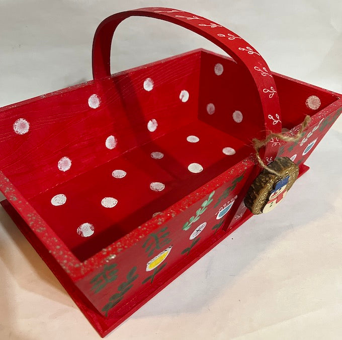 A full view of hand made wooden gift basket