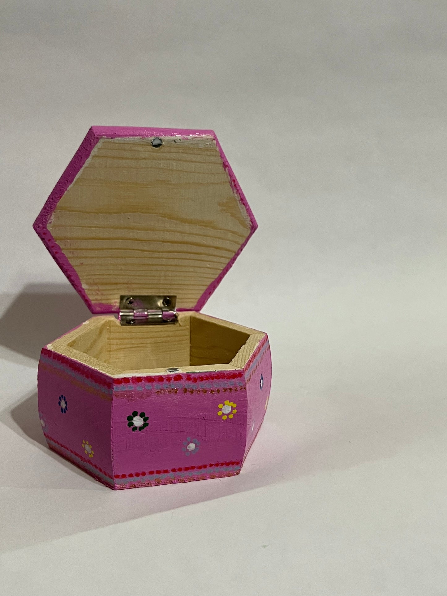 A jewel top hexagon wooden box painted with love!