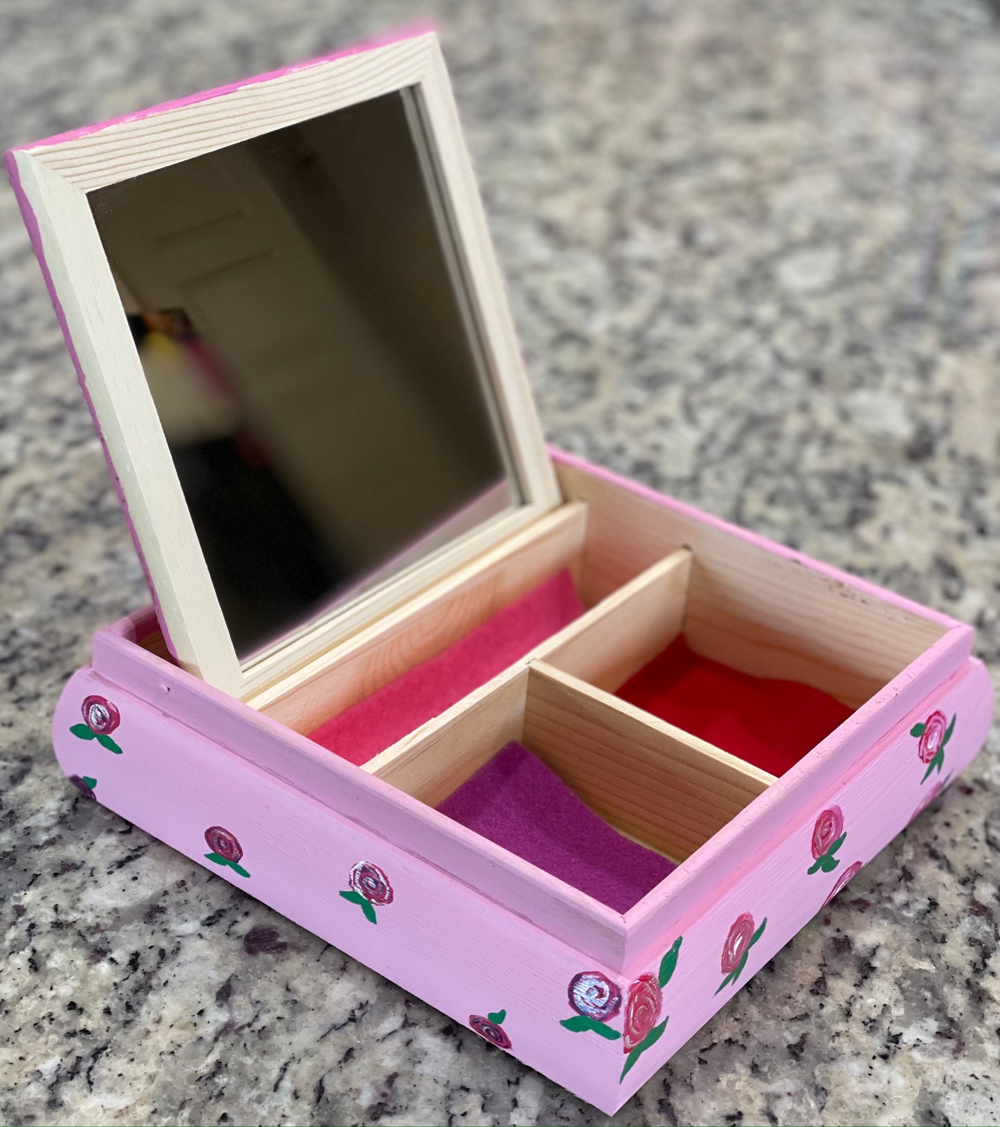 A pink hand painted rose glitter and shimmer jewelry box