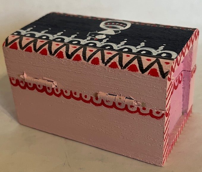 Pink hand painted wooden trinket with warli art.