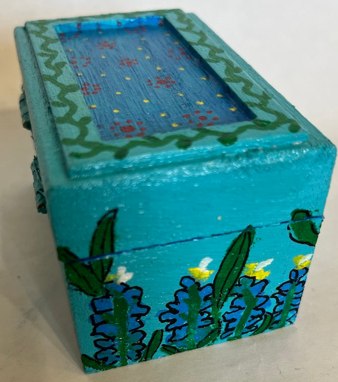 A hand painted blue bonnet themed small box