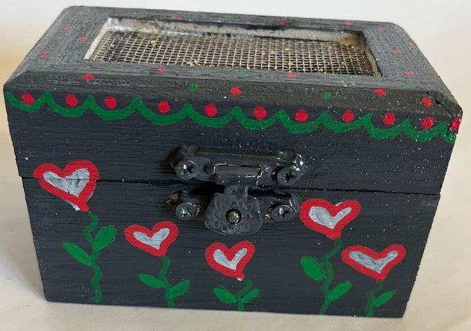 A hand painted gray wooden trinket
