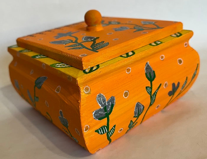 A pretty orange hand painted floral orange box
