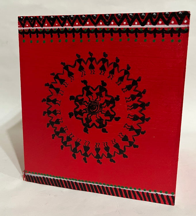 A hand painted Warli art red tissue box cover  