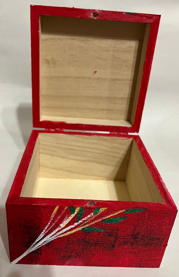 A square wooden hand painted box