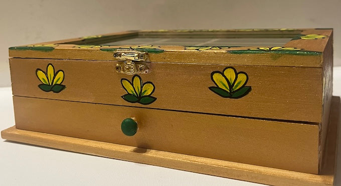 Drawer of a golden jewelry box