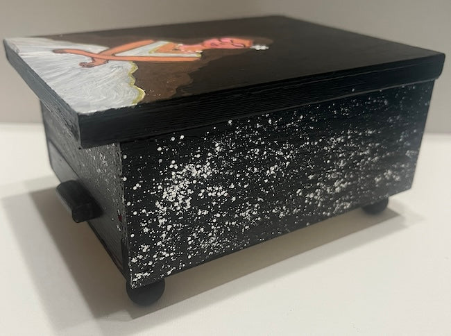 A black hand painted jewelry box
