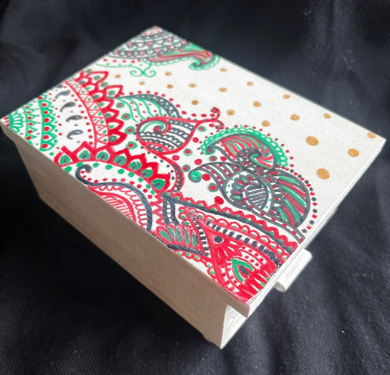 A mini hand painted jewelry box