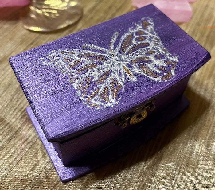 A mini wooden box hand painted & unique