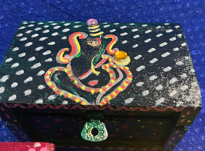 A beautiful hand painted Ganesha wooden box with lid.