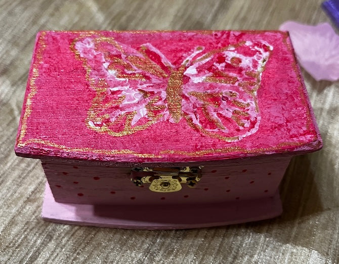 A mini wooden box hand painted & unique