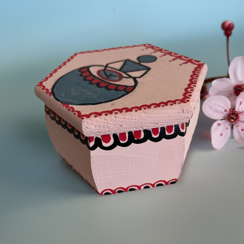 A hexagon shaped cute jewel top hand painted box