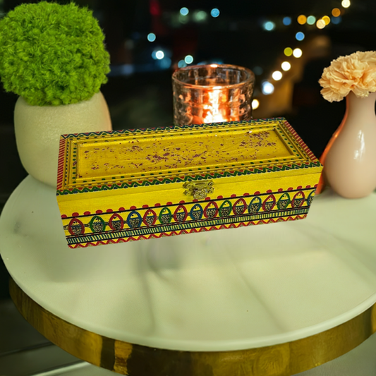 A hand painted yellow wooden gift box