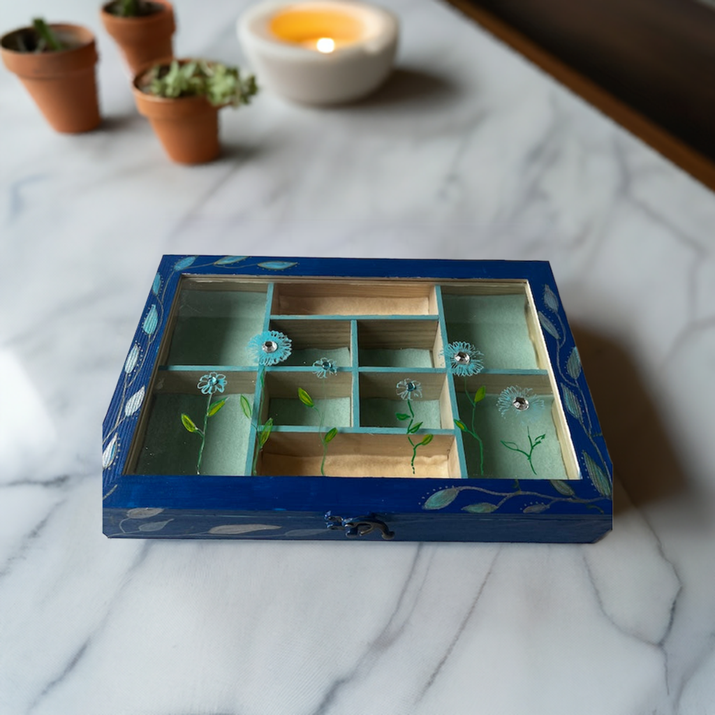 An elegant hand painted wooden box with gems