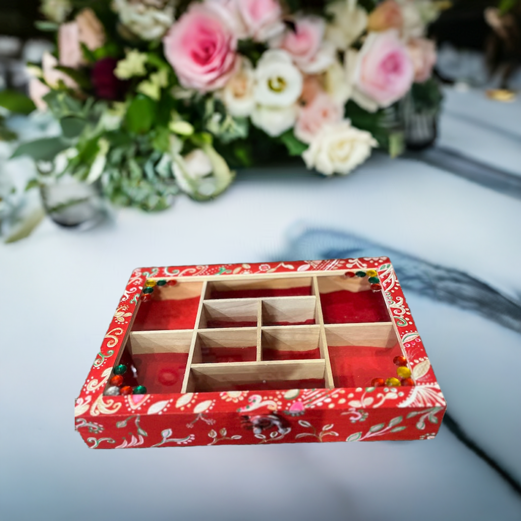 An elegant hand painted wooden box with gems