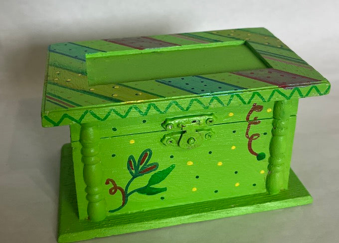 A green hand painted wood box