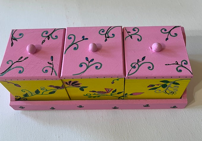 a hand painted yellow organizer