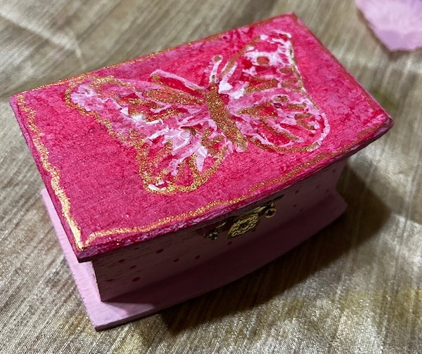 A mini wooden box hand painted & unique