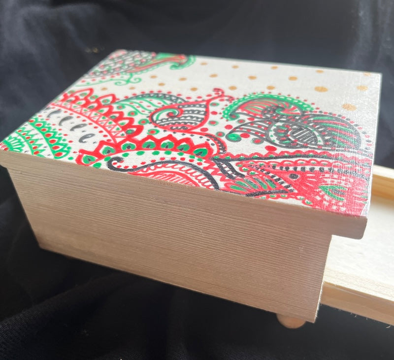 A mini hand painted jewelry box