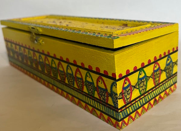 A bright and colorful hand painted long gift box