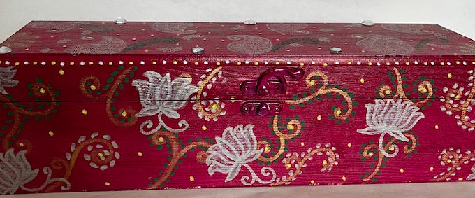 A lotus themed magenta wooden bangle box