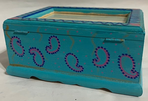 A hand painted paisley wood jewelry box