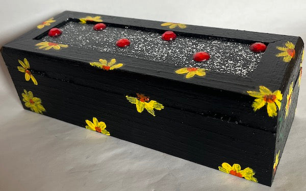 A black hand painted floral gift box