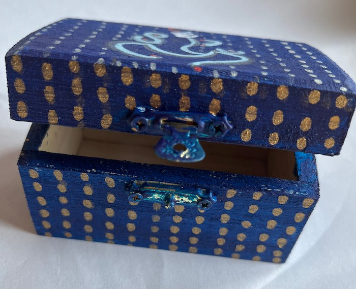 A blue hand painted box for small accessories gifting and storing