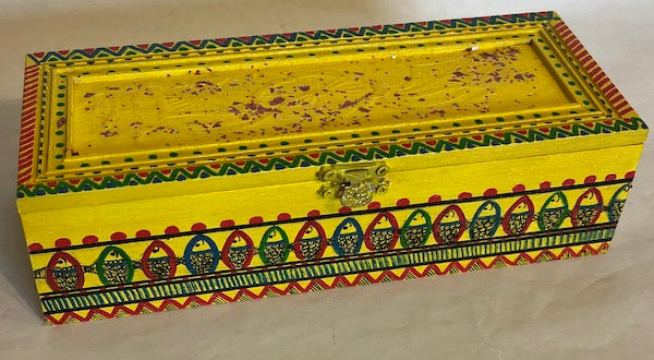 A yellow hand painted long gift box