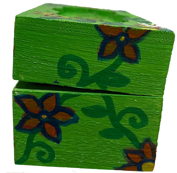 A hand painted green floral box