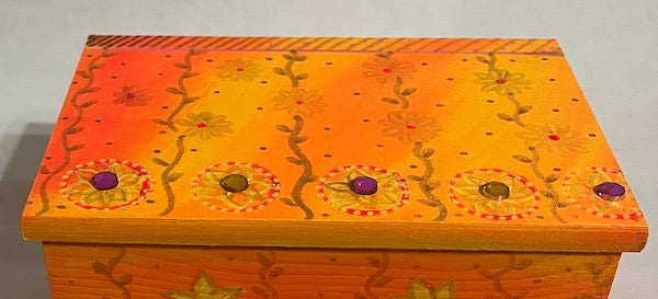 an orange yellow jewelry box