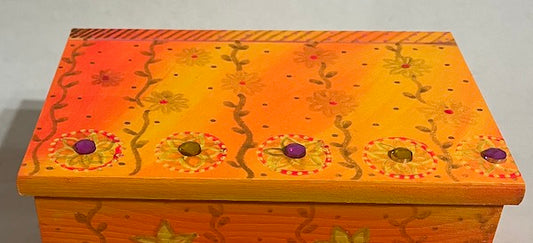 an orange yellow jewelry box