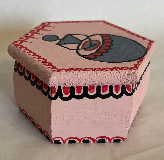 A pretty hand painted pink hexagon gift box