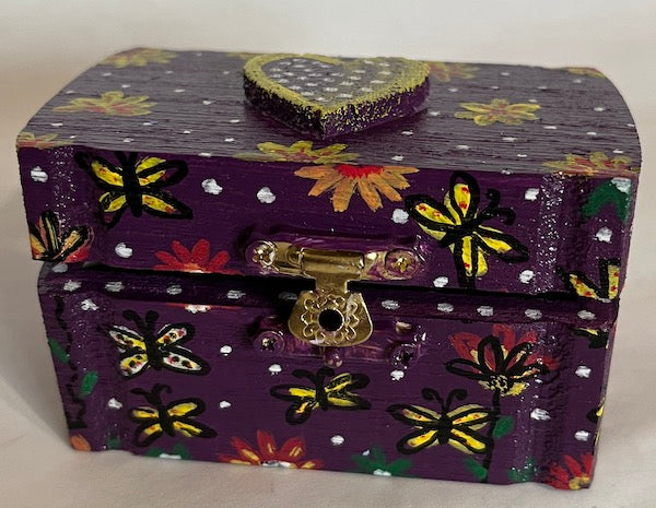 A hand painted purple box