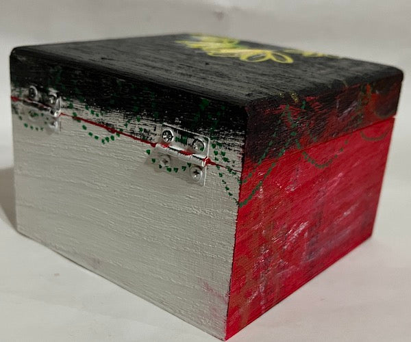 An abstract black and white hand painted wood box