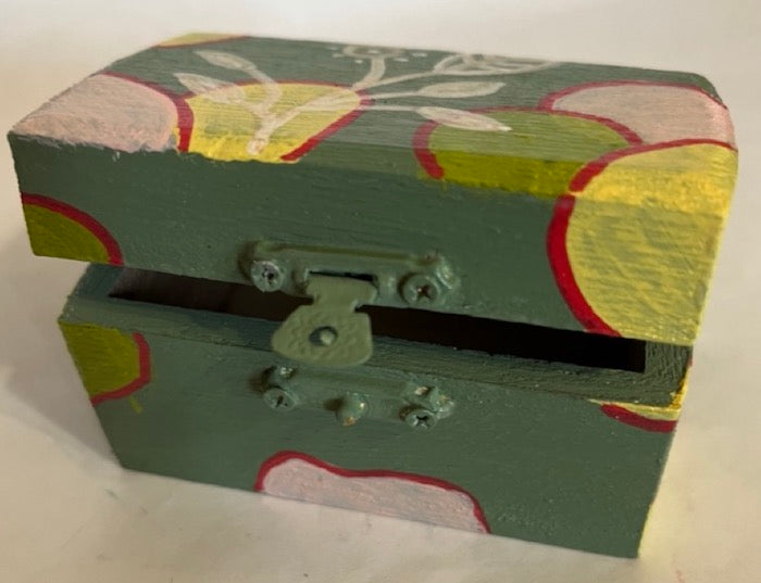 An olive green hand painted boho art small gift box