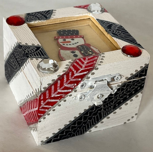 A white patter shadow box style wooden gift box