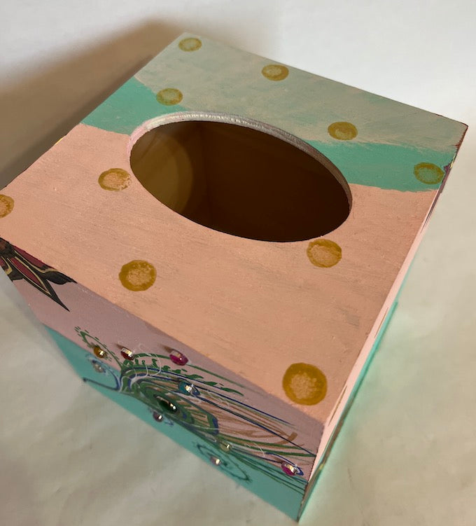 A shaded tissue box cover