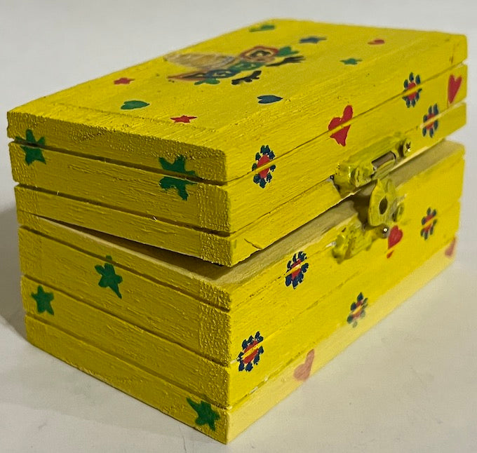 A yellow bright and beautiful hand painted unicorn box